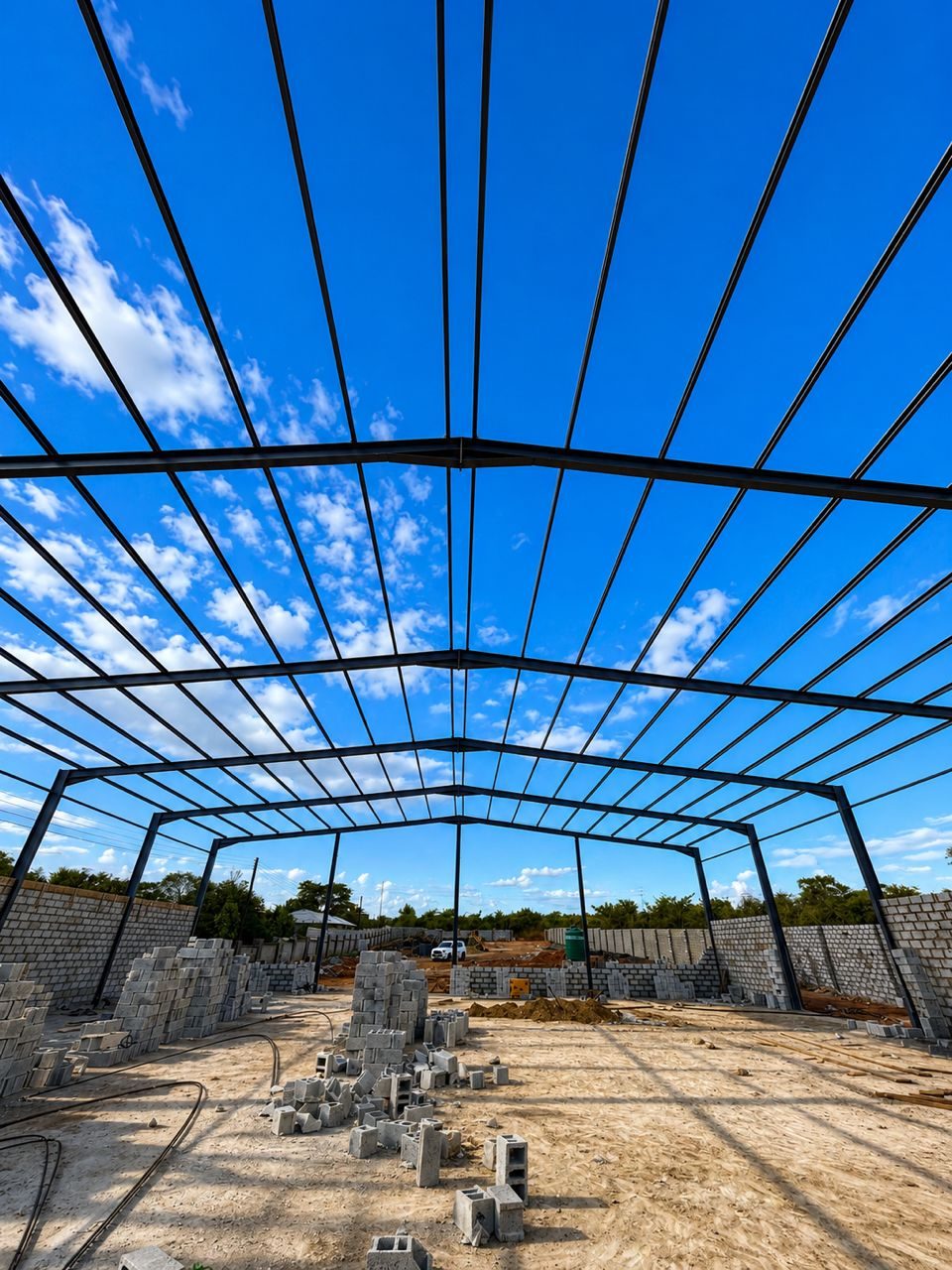 Steel warehouse structure under construction in Zambia